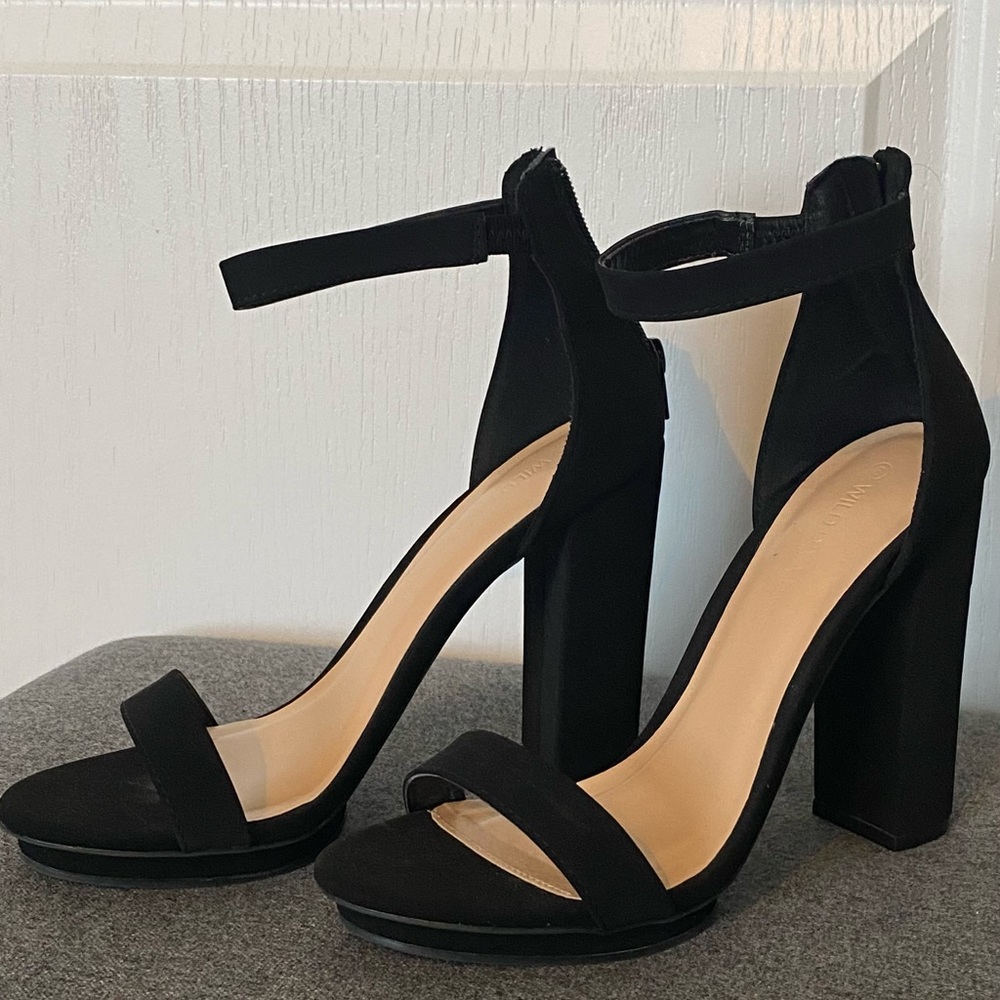 Black zip up heels